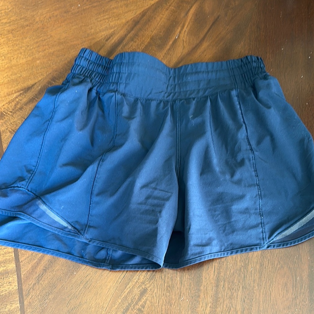 Lululemon hottie hot shorts 4” navy blue size 4 but after washing def smaller